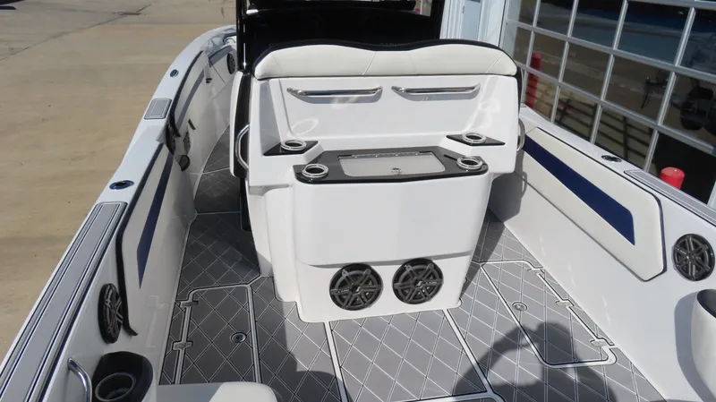 Slide: The Image of 2019 Sunsation 32 CCX boat interior with seating and speakers. - 16