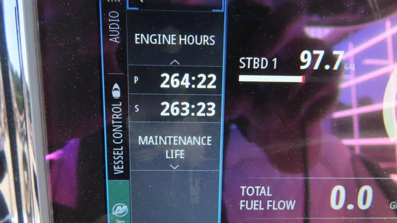 Slide: The Image of Display panel of 2019 Sunsation 32 CCX showing engine hours and fuel level. - 20