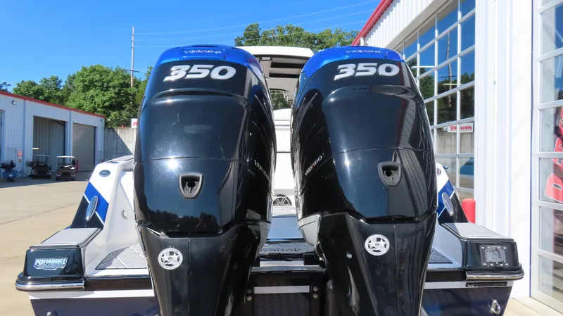 Slide: The Image of Twin 350 horsepower engines on a 2019 Sunsation 32 CCX boat. - 4