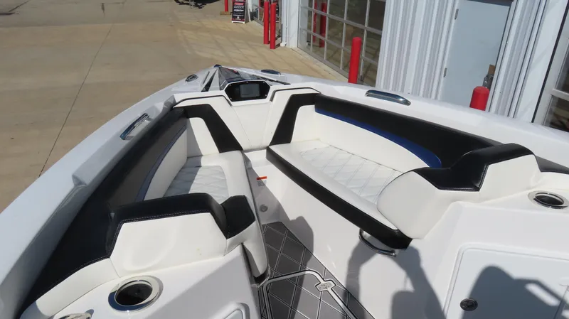 Slide: The Image of 2019 Sunsation 32 CCX boat interior with sleek seating and modern design. - 7