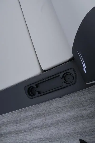 Slide: The Image of 2026 Bennington S Swingback 22 SSB interior with sleek seating and cup holders. - 13