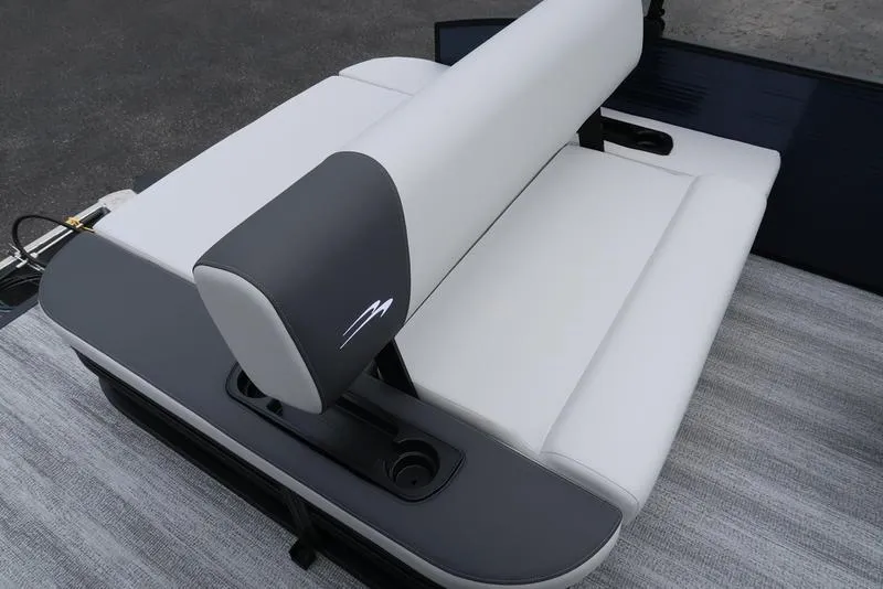 Slide: The Image of 2026 Bennington S Swingback 22 SSB boat seat, featuring sleek gray and white upholstery. - 16