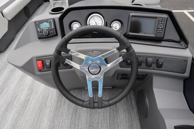 Slide: The Image of Steering console of 2026 Bennington S Swingback 22 SSB with modern controls and gauges. - 21