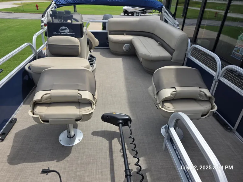 Slide: The Image of 2021 Sun Tracker Bass Buggy 16 XL pontoon boat interior with seating and steering console. - 6