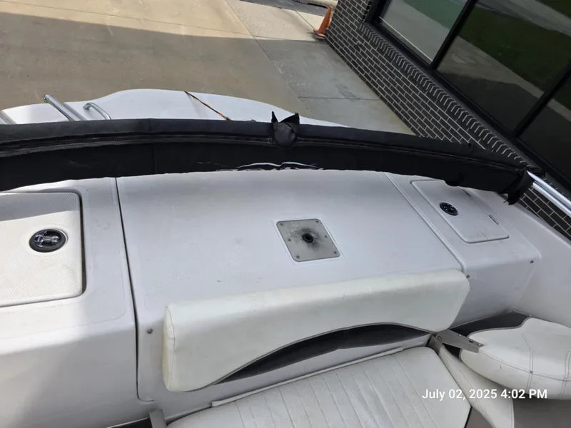 Slide: The Image of 2006 Tahoe Q6 SF boat interior with seating and storage compartments. - 4