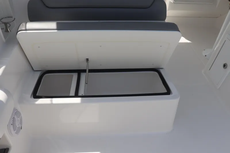 Slide: The Image of 2021 Albemarle 31 DC boat seat with open storage compartment. - 19