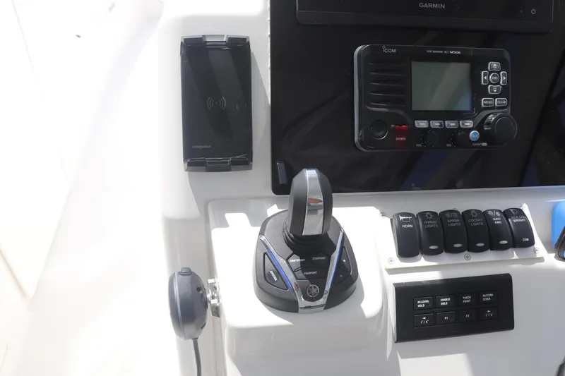 Slide: The Image of Control panel of 2021 Albemarle 31 DC boat with navigation and communication equipment. - 24