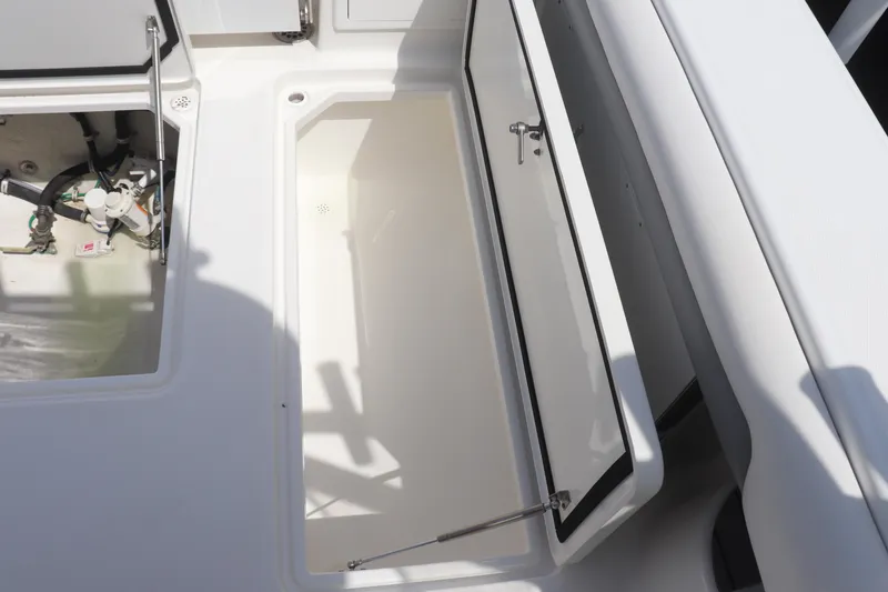 Slide: The Image of 2021 Albemarle 31 DC boat storage compartments and mechanical access. - 39
