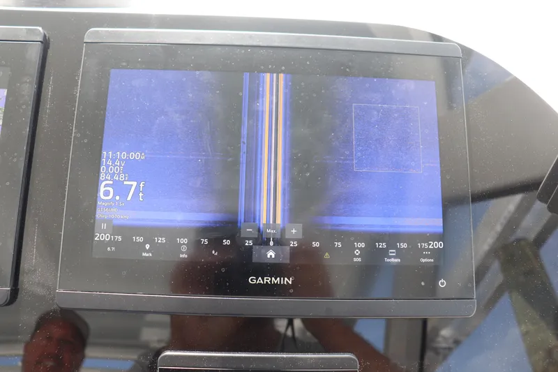 Slide: The Image of Garmin marine display on 2021 Albemarle 31 DC, showing sonar depth of 6.7 feet. - 45