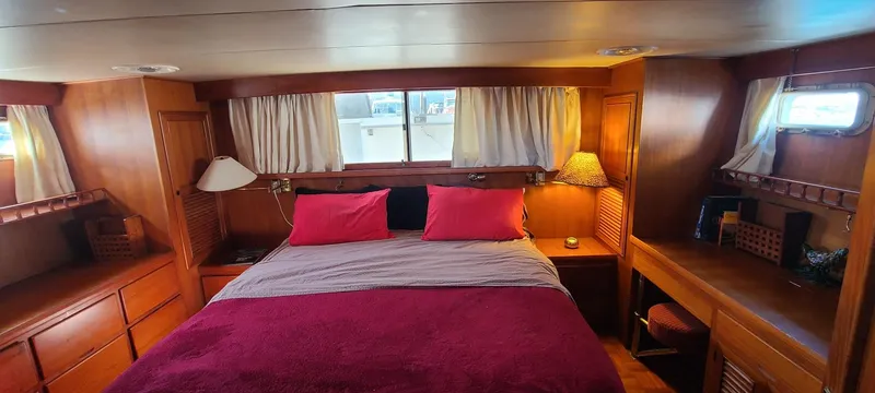 Slide: The Image of aft cabin showing large comfortable bed - 8
