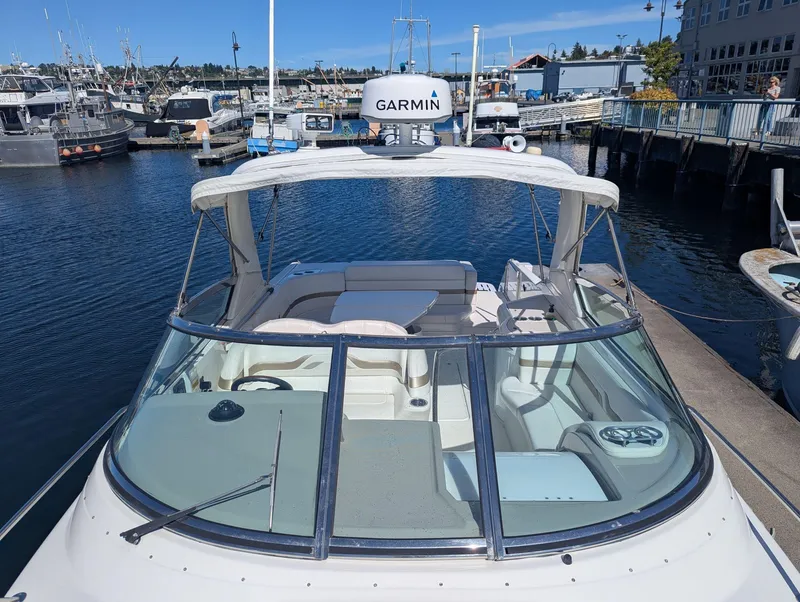 Slide: The Image of 2003 Formula 330 SS boat docked at marina with Garmin equipment. - 11