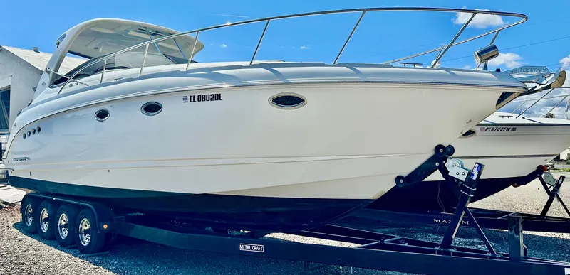 Slide: The Image of 2008 Chaparral 350 Signature boat on trailer, side view, sunny day. - 15