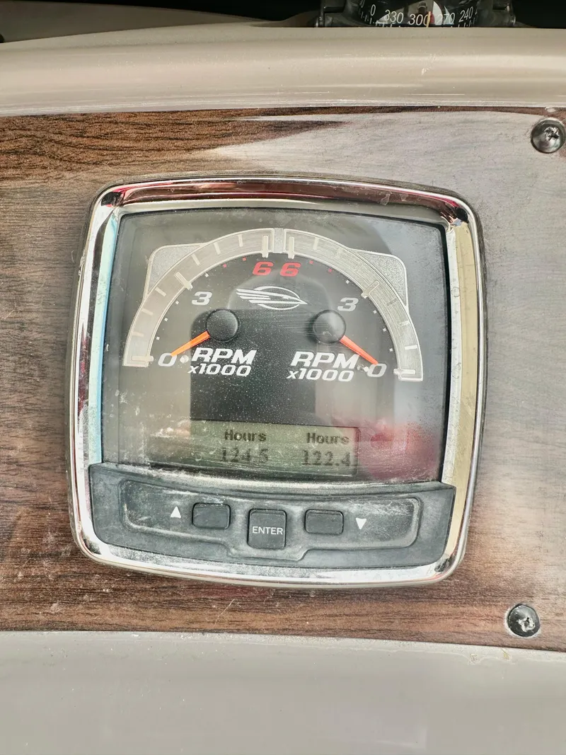 Slide: The Image of Dashboard of 2008 Chaparral 350 Signature showing RPM and engine hours. - 6