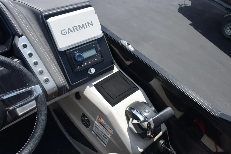 Slide: The Image of 2022 Barletta L25UC boat dashboard with Garmin navigation system and control panel. - 13