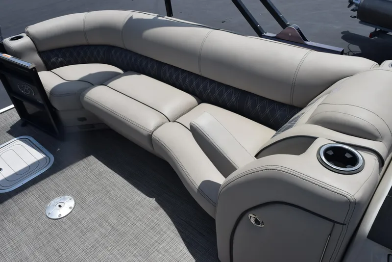 Slide: The Image of Luxurious seating on 2022 Barletta L25UC pontoon boat with cup holder and stylish upholstery. - 9