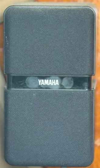 Slide: The Image of Black Yamaha electronic device with textured surface, featuring a central logo. - 19