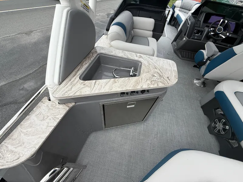 Slide: The Image of Luxurious interior of 2025 Avalon 2785 Excalibur LTD ELW pontoon boat with modern amenities. - 19