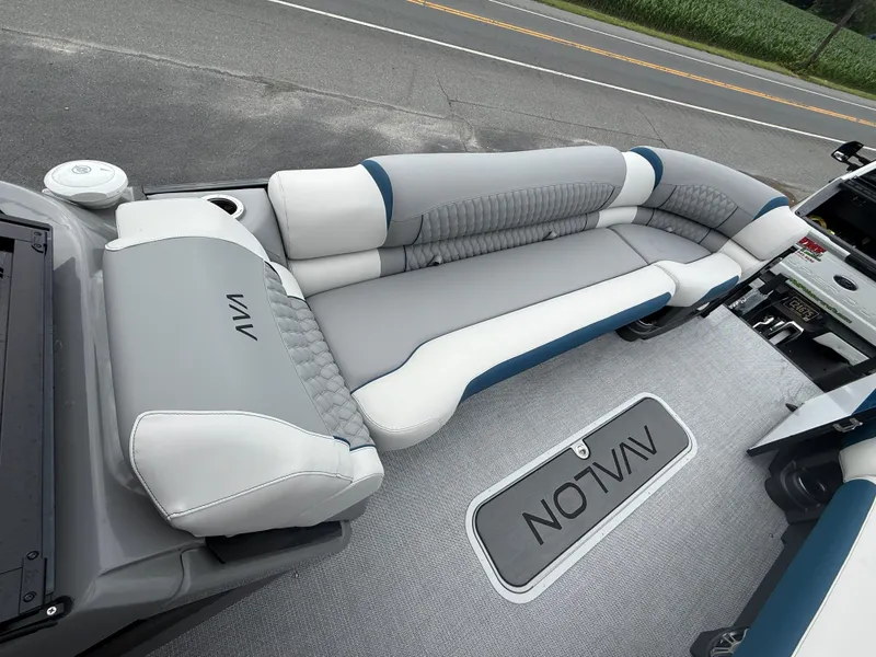 Slide: The Image of 2025 Avalon 2785 Excalibur LTD ELW boat interior with luxurious seating and joystick controls. - 22