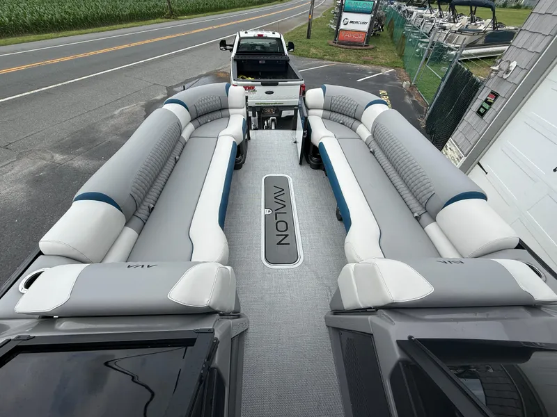 Slide: The Image of 2025 Avalon 2785 Excalibur LTD ELW pontoon boat with spacious seating and modern design. - 24