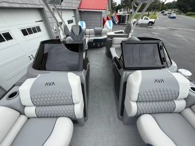 Slide: The Image of Luxurious 2025 Avalon 2785 Excalibur LTD ELW pontoon boat with elegant seating and joystick controls. - 25