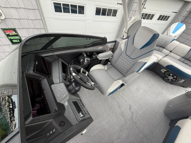 Slide: The Image of Luxurious 2025 Avalon 2785 Excalibur LTD ELW boat interior with joystick controls. - 26