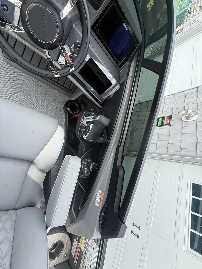 Slide: The Image of Interior of 2025 Avalon 2785 Excalibur LTD ELW with joystick controls and modern dashboard. - 30