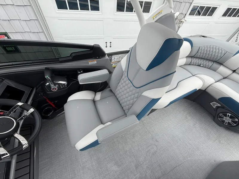Slide: The Image of 2025 Avalon 2785 Excalibur LTD ELW interior with joystick controls and luxury seating. - 33