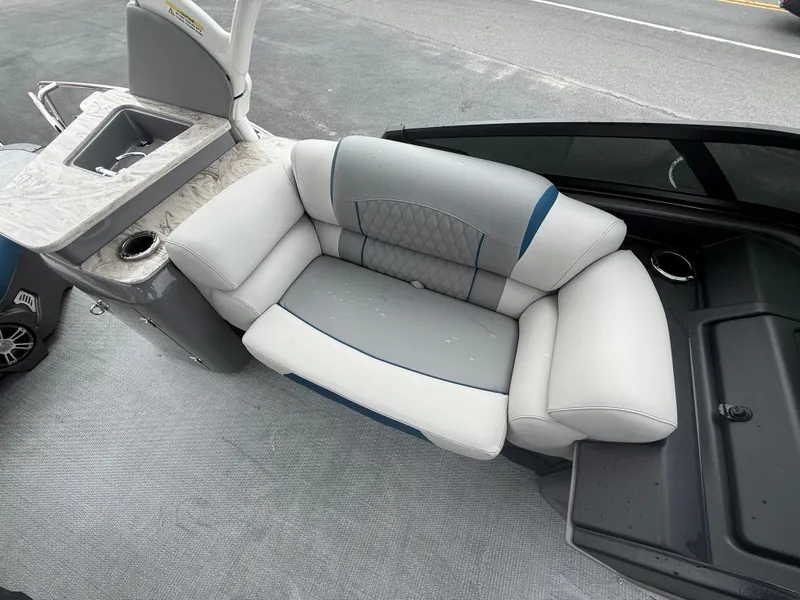 Slide: The Image of Luxurious seating on 2025 Avalon 2785 Excalibur LTD ELW pontoon boat with sink and cup holder. - 34