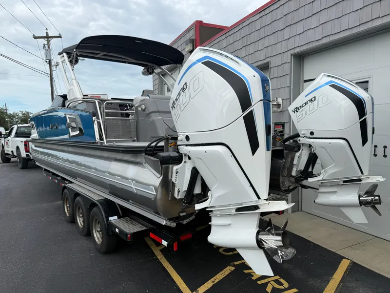 Slide: The Image of 2025 Avalon 2785 Excalibur LTD ELW tri-toon boat with twin Mercury Racing 500R engines. - 5