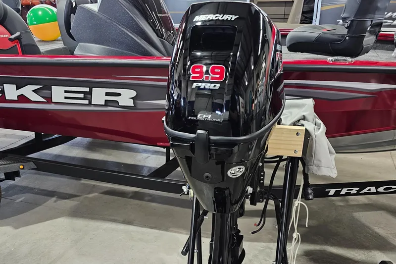 Slide: The Image of 2024 Mercury 9.9 hp EFI ProKicker outboard motor on a Tracker boat. - 3