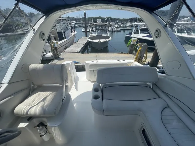 Slide: The Image of Interior view of a 2004 Bayliner 285 boat docked at a marina. - 11