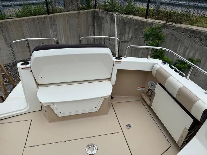 Slide: The Image of 2016 Cutwater 288 C boat interior with seating and storage compartments. - 9