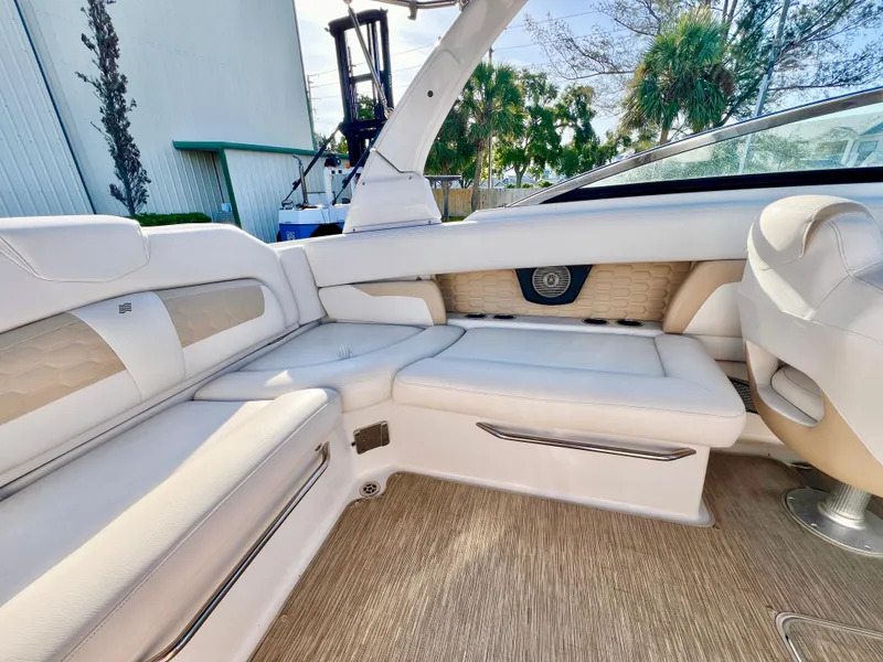 Slide: The Image of Luxurious interior of 2018 Four Winns HD270 OB boat with plush seating. - 10