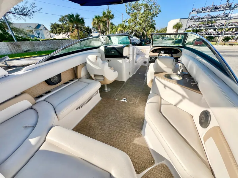 Slide: The Image of 2018 Four Winns HD270 OB boat interior with luxurious seating and modern design. - 7