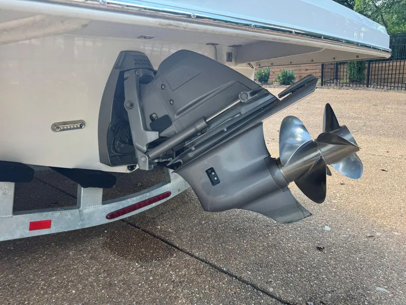 Slide: The Image of 2014 Regal 2300 Bowrider boat with Volvo Penta outdrive and dual propellers. - 7