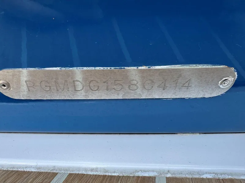 Slide: The Image of 2014 Regal 2300 Bowrider boat hull identification number plate. - 8