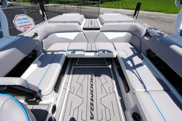 Slide: The Image of 2023 Moomba Kaiyen boat interior with spacious seating and modern design. - 12