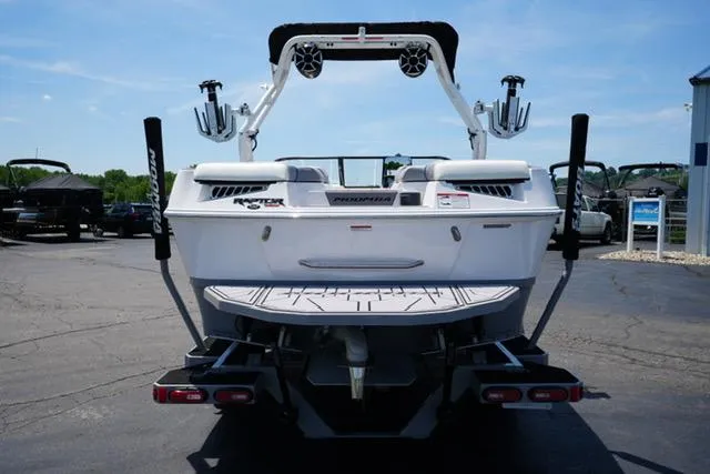 Slide: The Image of 2023 Moomba Kaiyen boat rear view with wakeboard tower and speakers. - 4