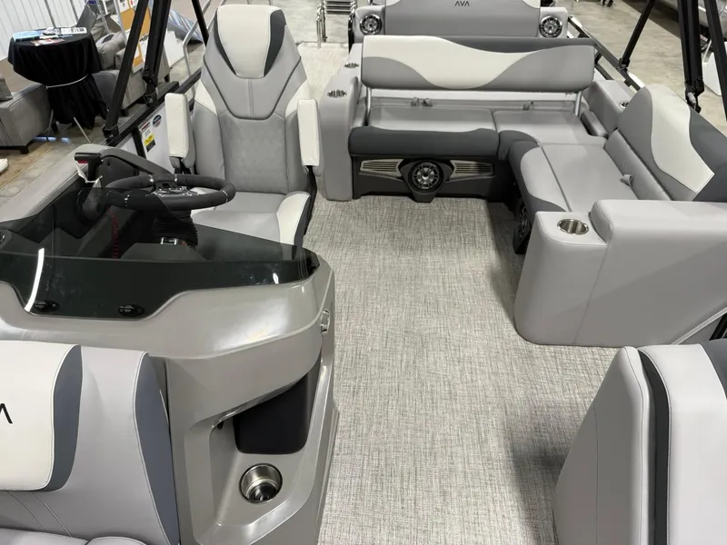 Slide: The Image of 2025 Avalon LSZ Versatile Rear Lounger interior with modern seating and steering console. - 18