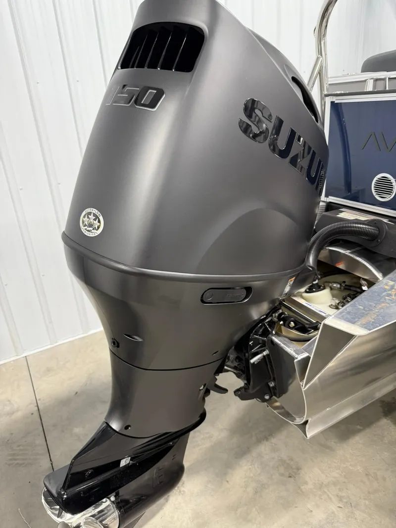Slide: The Image of Suzuki 150 outboard motor on 2025 Avalon LSZ Quad Lounger boat. - 19