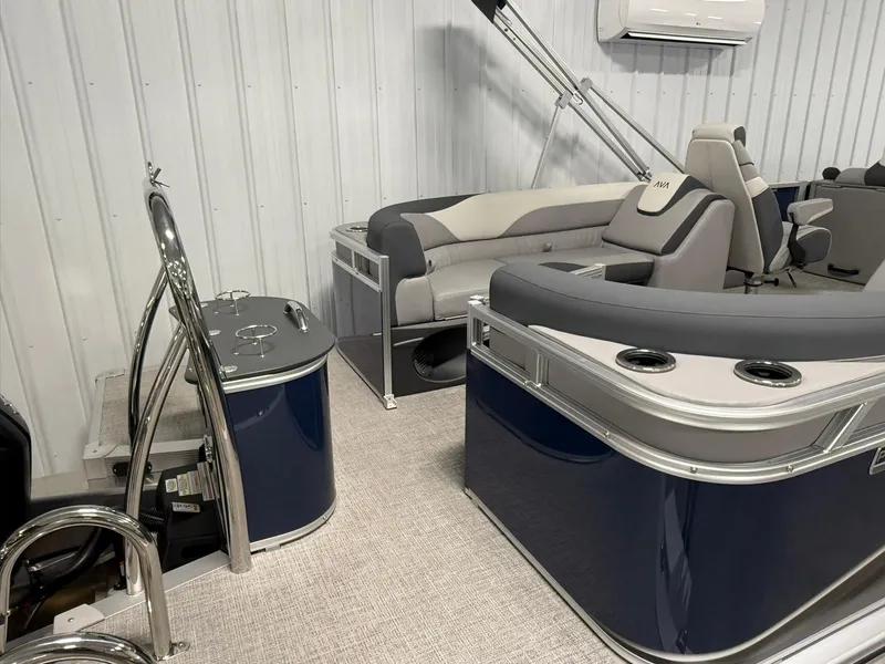 Slide: The Image of 2025 Avalon LSZ Quad Lounger boat interior with plush seating and modern design. - 5