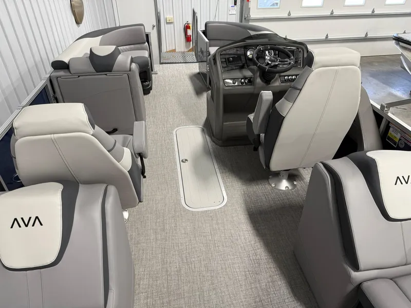 Slide: The Image of 2025 Avalon LSZ Quad Lounger interior with modern seating and steering console. - 7