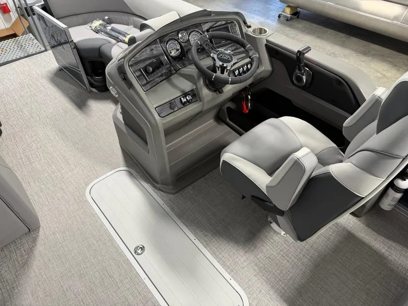 Slide: The Image of 2025 Avalon LSZ Quad Lounger interior with modern helm and comfortable seating. - 8