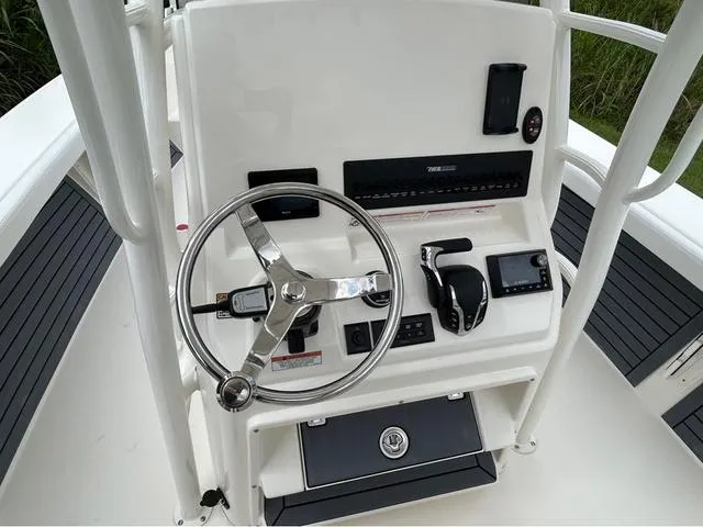 Slide: The Image of 2025 Pathfinder 2700 Open boat interior with seating and storage compartments. - 31