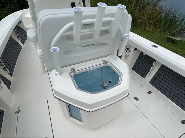Slide: The Image of 2025 Pathfinder 2700 Open boat deck with storage compartments and sleek design. - 33