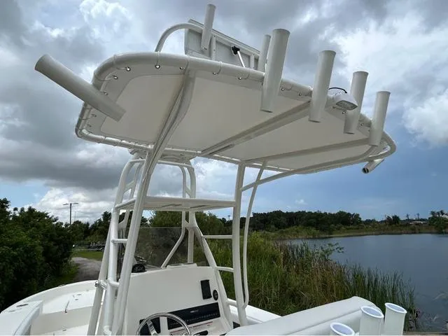 Slide: The Image of 2025 Pathfinder 2700 Open boat electrical panel with open access door. - 36