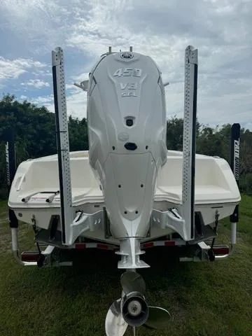 Slide: The Image of 2025 Pathfinder 2700 Open boat with powerful V8 engine, displayed on a trailer. - 4