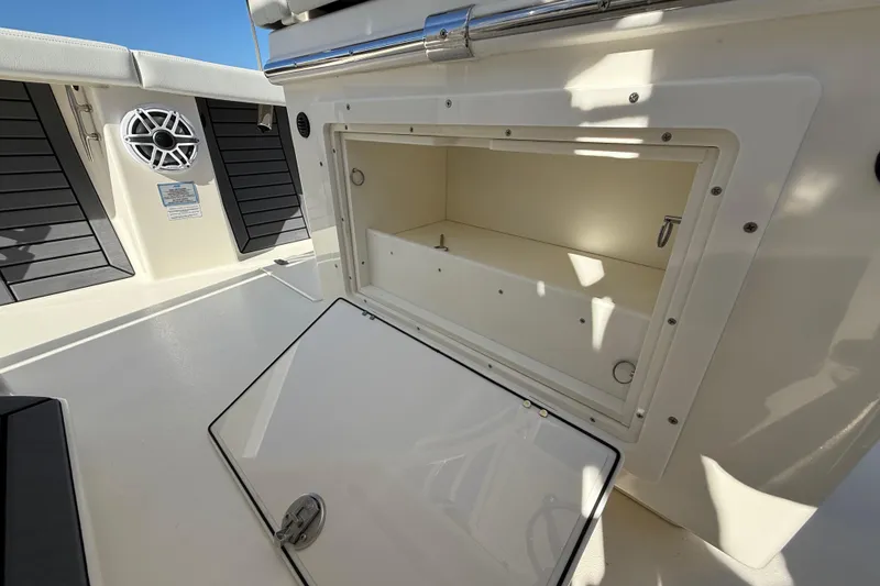 Slide: The Image of Open storage compartment on 2025 Pathfinder 2700 Open boat deck. - 40