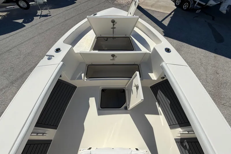 Slide: The Image of 2025 Pathfinder 2700 Open boat deck with open storage compartments. - 43