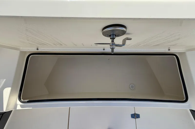 Slide: The Image of 2025 Pathfinder 2700 Open boat storage compartment with drainage. - 45